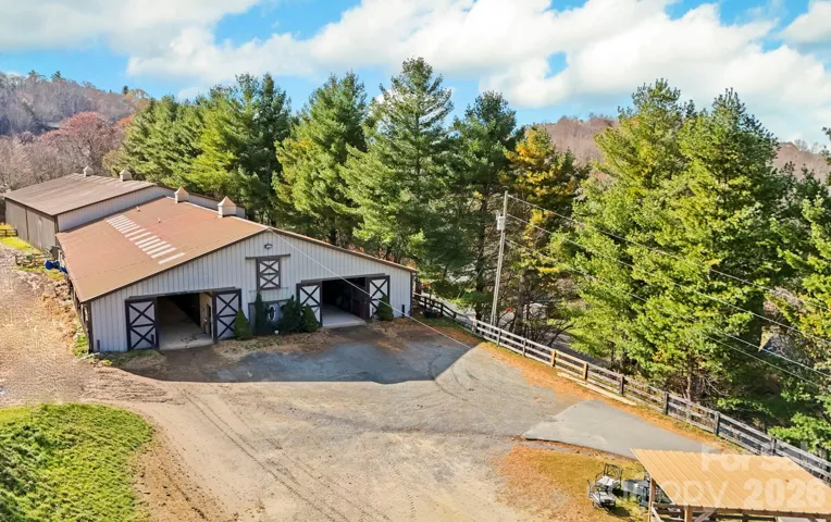 27-stall barn and indoor riding ring