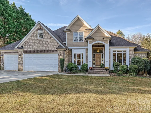 Beautiful, Spacious, 4 Bedroom, 3.5 Bath Home located on a large, private lot (on 13th hole of the GC) in a desirable, well established neighborhood with LAKE ACCESS!