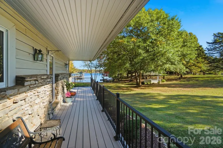 Full composite decking, that wraps around the side and rear of the home is wonderful for coffee time or grilling with family and friends.