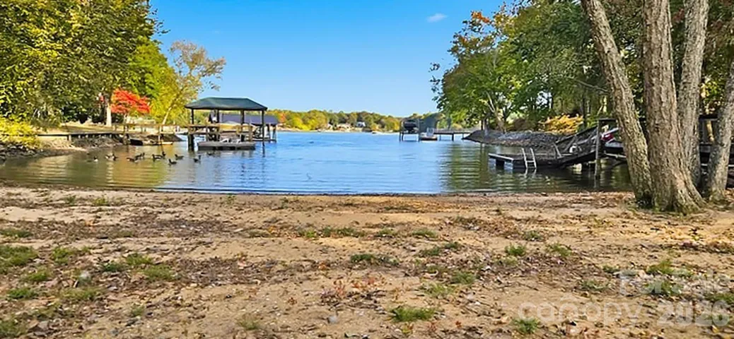 Sandy beach is great for relaxing in your favorite lounge chair or launching your kayak, etc