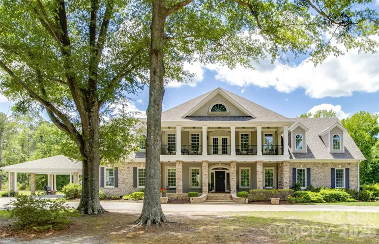 A timeless Southern estate showcasing elegant architecture, refined craftsmanship, and classic luxury in a peaceful, private setting.