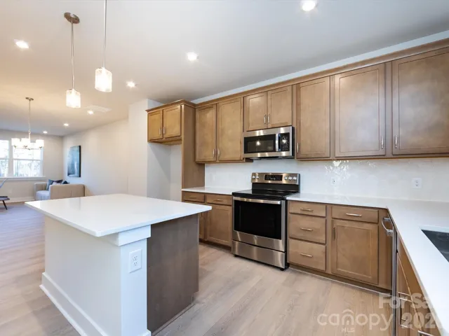 Quartz Countertops Across Kitchen and Island