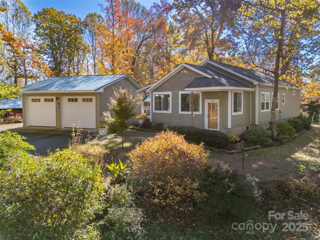 Side profile of house and 2 car garage