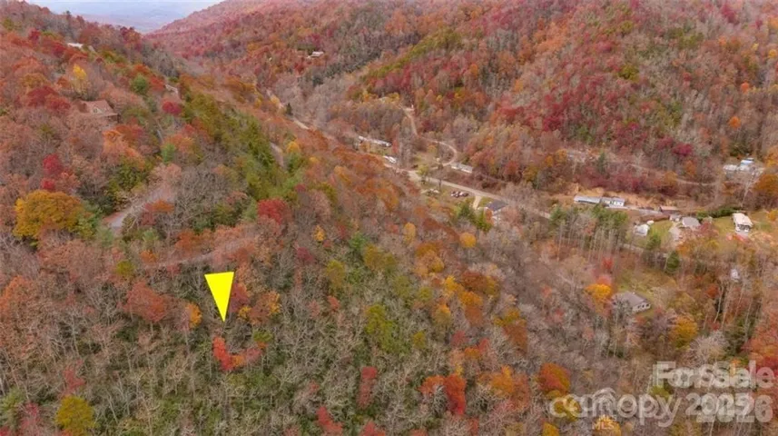 Aerial view of property with Davey Crockett rd and swtichback visible
