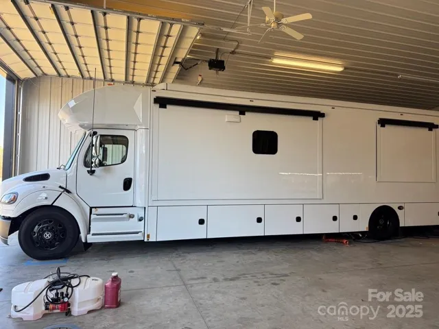 Fits large motorhome (50' deep building)