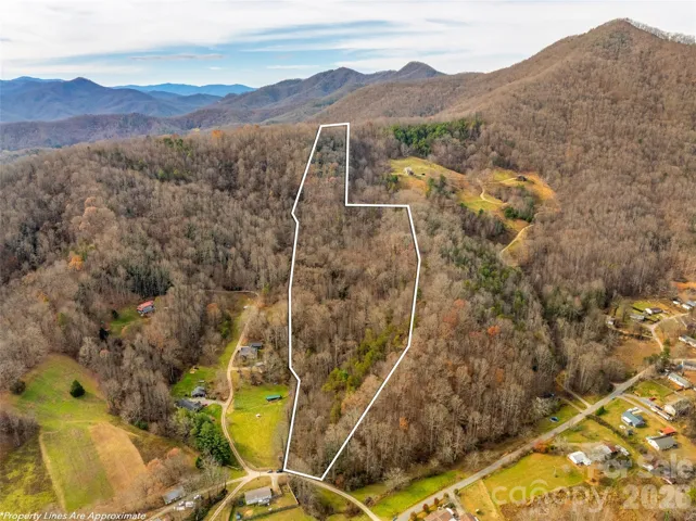 This one-of-a-kind parcel, held by the same family since 1942, is now ready for its next chapter. With Open Use zoning, it offers a rare blank canvas for your vision—whether that’s a private mountain retreat, mini farm, thoughtfully planned residential enclave, or long-term legacy investment.