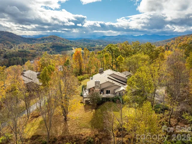 Aerial perspective highlighting this condo's prime location and panoramic mountain vistas.