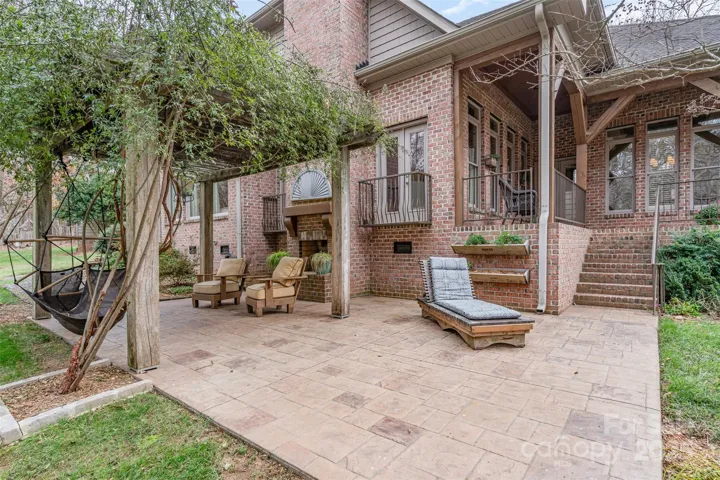 Back Patio w/ covered porches & pergola