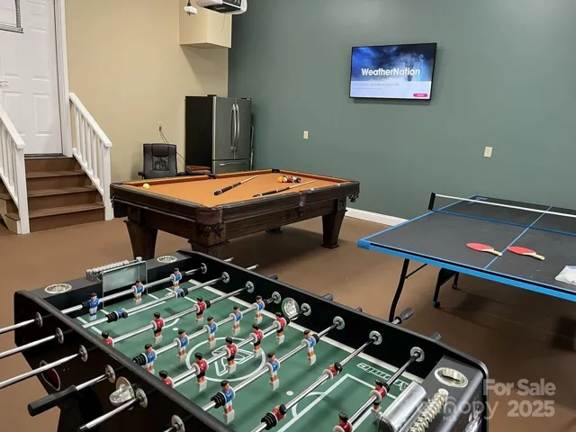 Game room also has wall mounted 54 inch TV and refrigerator. You can play all night! 