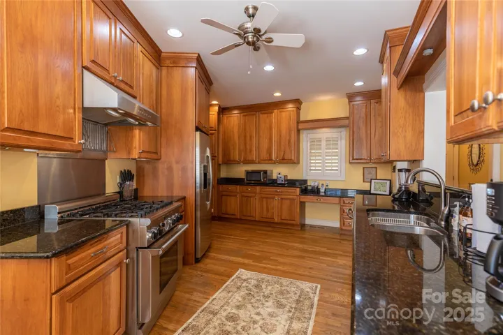 Another view of kitchen. Visitors have loved the warming rack over stove. 