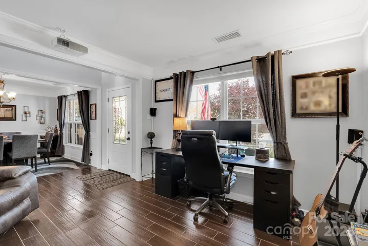 Entry to home - office on left and dining on right