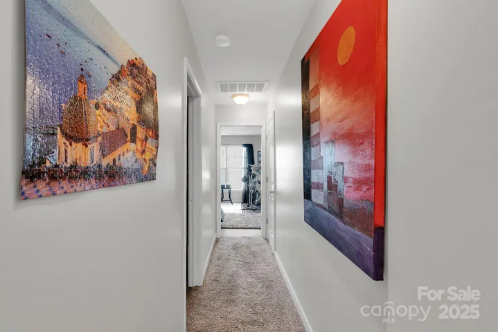 Hallway to bedroom/bonus and bathroom