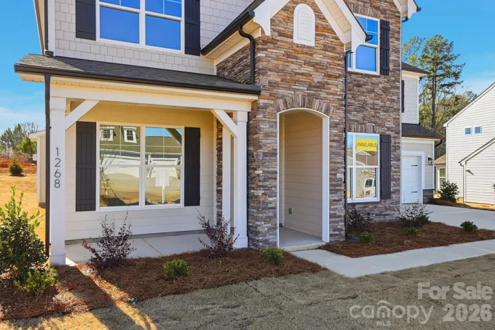 Beautiful front porch with stone veneer