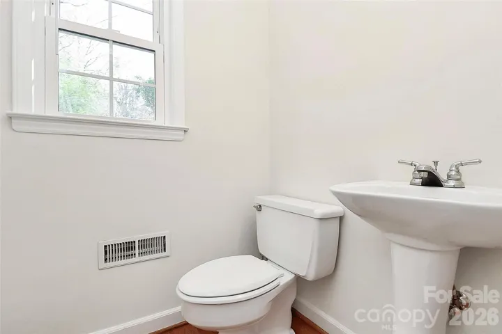 Half bath near kitchen and side entrance