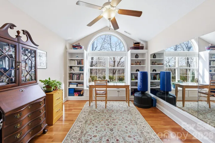 Office/Den has built-in shelving