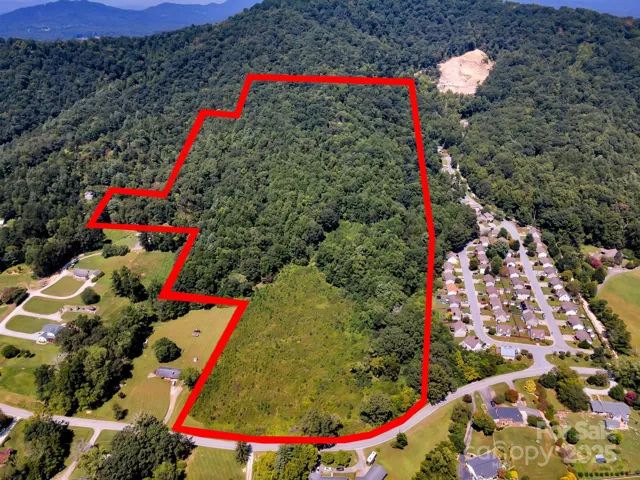 48.20 acres with over 470 ft of road frontage on Hoopers Creek Rd.