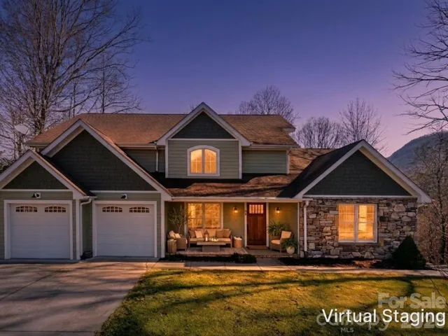 Twilight exterior render with virtually staged area on spacious front porch