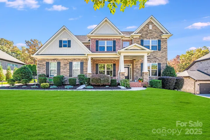 Gorgeous all brick home with shake accents