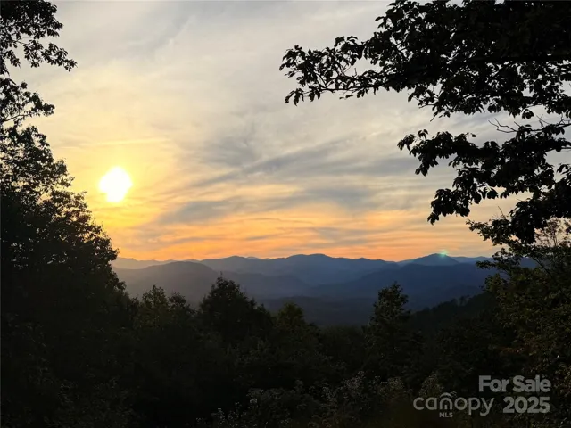 One of the BEST Sunset views with over 4 acres!!!! Privacy on a perch!