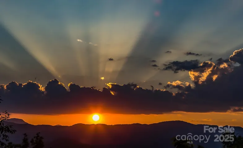 Beautiful Sunsetting Mountain Views from this lot and the two lots "below" (*across The Falls Rd) - You can purchase all the lots from the seller including the Waterfall Lot and the lots with the Cave- A Big Nature Park of your own!!!