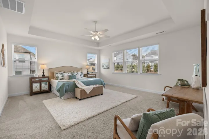 Oversized primary suite offers a peaceful retreat with room to relax and unwind.