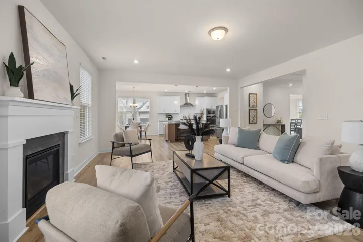 Gas fireplace adds warmth and comfort, creating a cozy focal point in the living space.