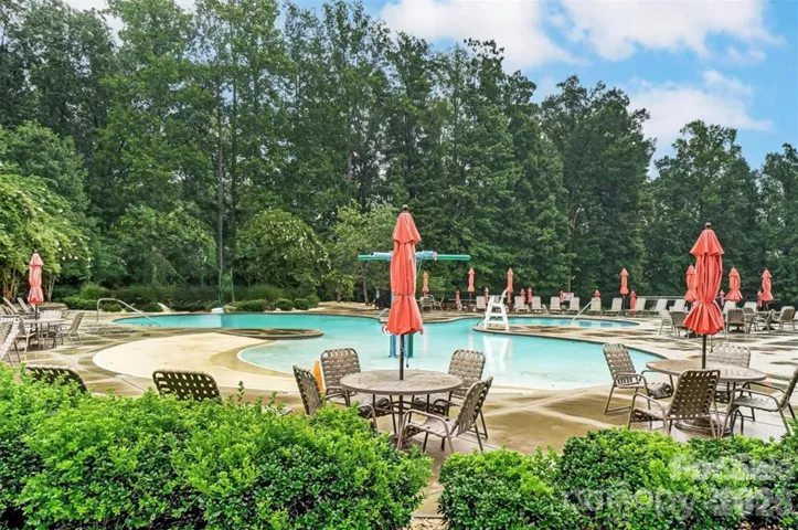 Resort-style zero-entry pool creates a relaxed setting for soaking up the sun, casual swimming, and effortless enjoyment for children and adults alike.