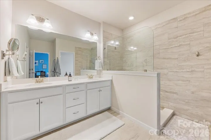Primary ensuite bathroom with oversized shower