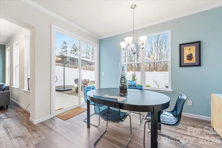Dining area opens to the backyard