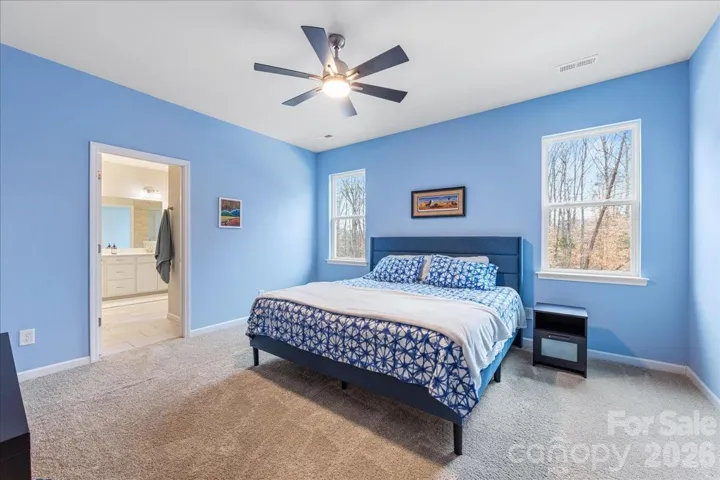 Primary suite with wooded views