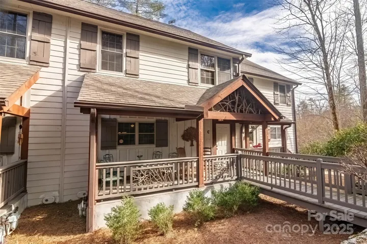 Front of unit C with its cool sitting porch and ramp to the front door.