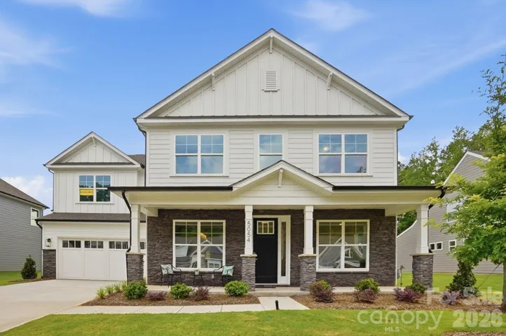 Homesite 96 features a Colfax L floorplan