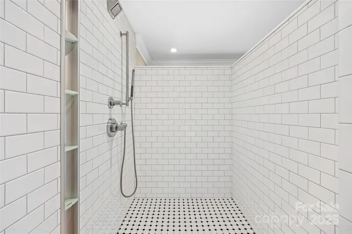 Large walk-in shower in the primary bathroom