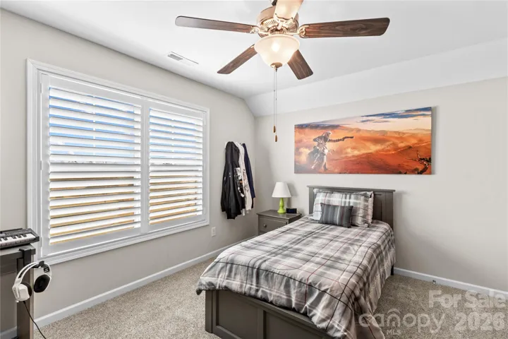 3rd Bedroom with ceiling fan, plantation shutters