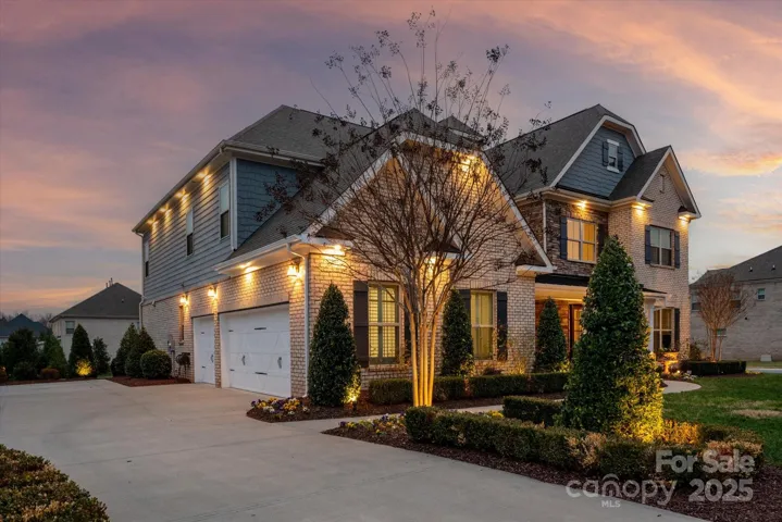 a 5 BR/4.5 Bath home With Professional Landscape lighting