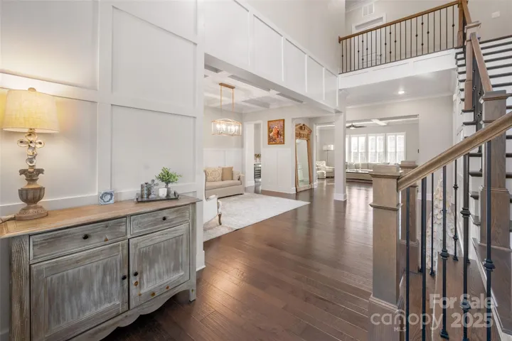 2 story foyer and hardwoods throughout the main, stairs, upper hall and primary bedroom