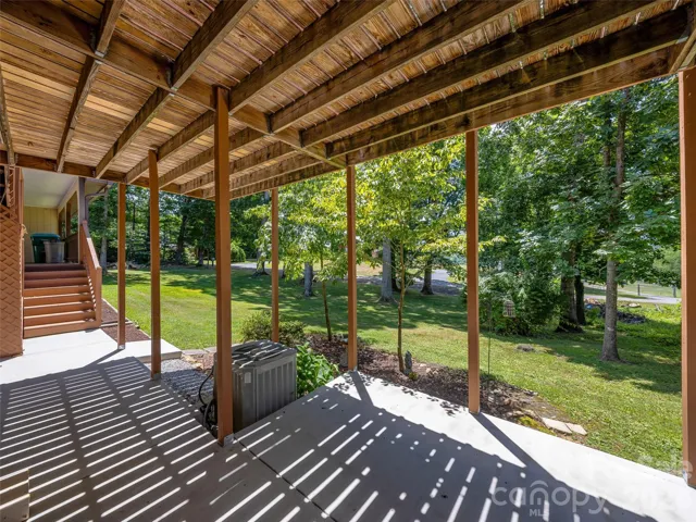 Private LL entry with covered patio and picturesqe yard