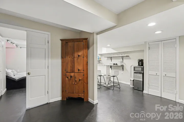 View into the 4th bedroom with a double door entry in the lower level and your kitchenette.