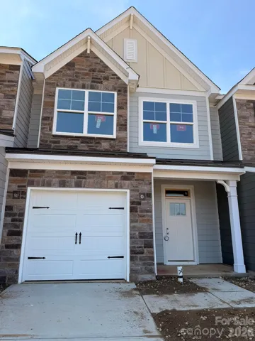 Homesite 206 features an Ashland L plan