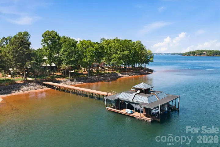 Boat dock with two boat lifts.