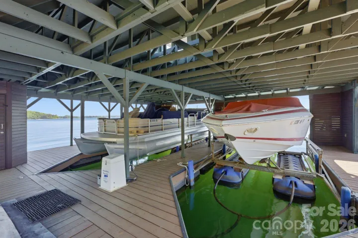 Boat dock with two boat lifts.