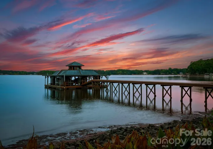 Boat dock with two boat lifts. 