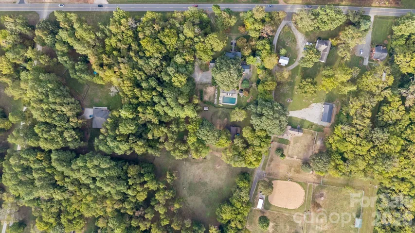 14.87 acres of beautiful private lot, perfect for those long horse rides.