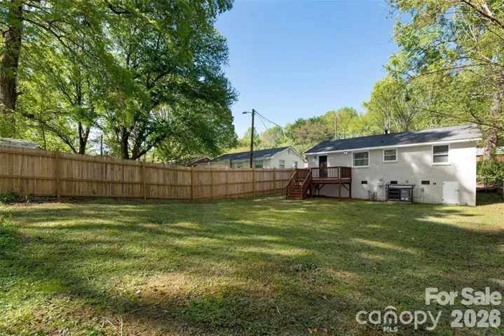 Enjoy gardening or entertaining in this fabulous, flat Backyard.