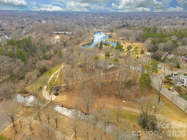 Aerial view capturing Freedom Park’s lakes and winding trails, perfect for walking, running, or relaxing outdoors.