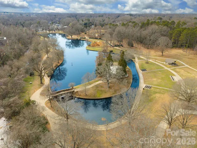 Drone view over Freedom Park featuring tennis courts, ball fields, and open recreational areas just blocks away.