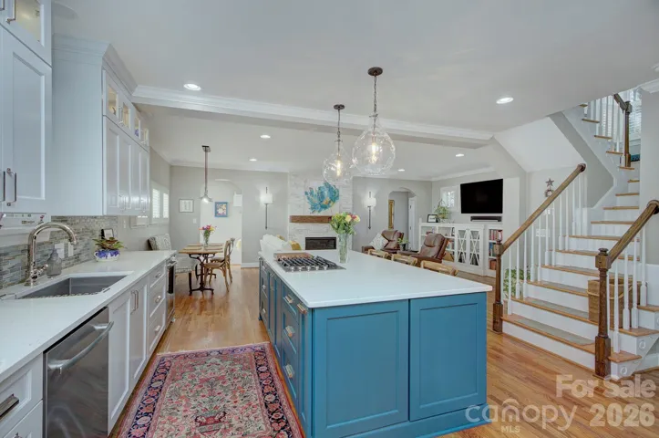 Spacious kitchen layout with abundant cabinetry, stainless appliances, and easy flow for entertaining.