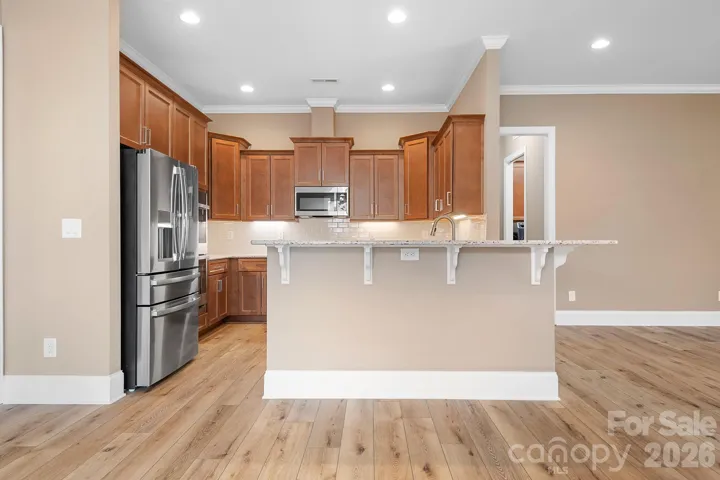 view from dining area into kitchen