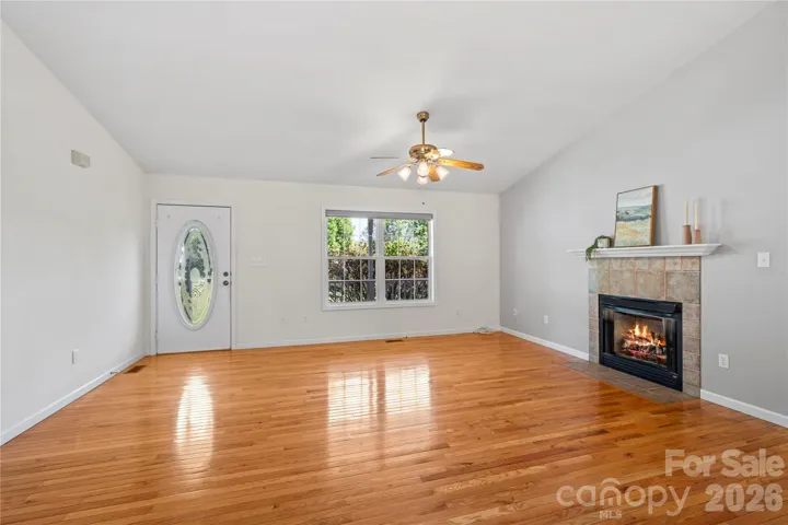 Living room / dining area feature hardwood floors