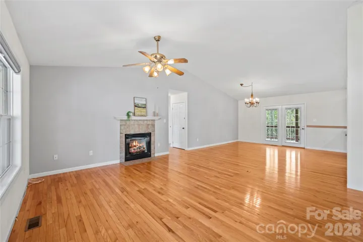 Main living area has vaulted ceiling